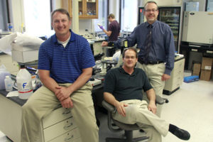 An interdisciplinary team of researchers at the University of Nebraska Medical Center in Omaha—Michael Duryee (left), Geoff Thiele (center) and Dan Anderson (right)—believe they found a way to determine who will develop potentially deadly heart disease with a simple blood test.