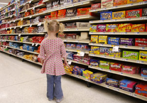 Until she discovered the candy aisle at the supermarket, Madeleine Litton, 3, had no idea such a bounty of sweet happiness could exist.