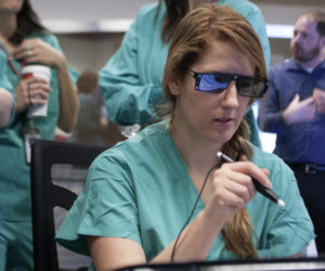 Brittney White, a cardiovascular tech in the Cardiac Catheter Lab at Nebraska Medicine, checks out on the 3D imaging tools during the iEXCEL Expo Tuesday, Oct. 20, 2015, during UNeMed's Innovation and Research WeeK.