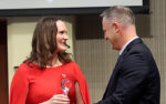 UNeMed President and CEO Michael Dixon, PhD, (right) presents UNMC researcher Rebekah Gundry,PhD, with the 2023 Emerging Inventor award during the Innovation Awards ceremony on Thursday, Nov. 2, 2023
