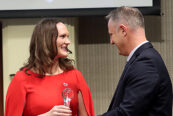 UNeMed President and CEO Michael Dixon, PhD, (right) presents UNMC researcher Rebekah Gundry,PhD, with the 2023 Emerging Inventor award during the Innovation Awards ceremony on Thursday, Nov. 2, 2023