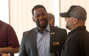 Lamonte Russell, UNeTech Institute's Strategy and Ventures Manager, chats with guests during UNeMed's Idea Pub: Morning Edition at Omaha Catalyst on Aug. 28, 2025. Russell, along with UNO's Brent Clark (not pictured), leads the Maverick Technology Alliance, a student-led business strategy program that was UNeMed's 2024 Innovation Champion.